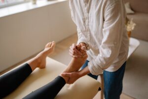a client having a foot massage